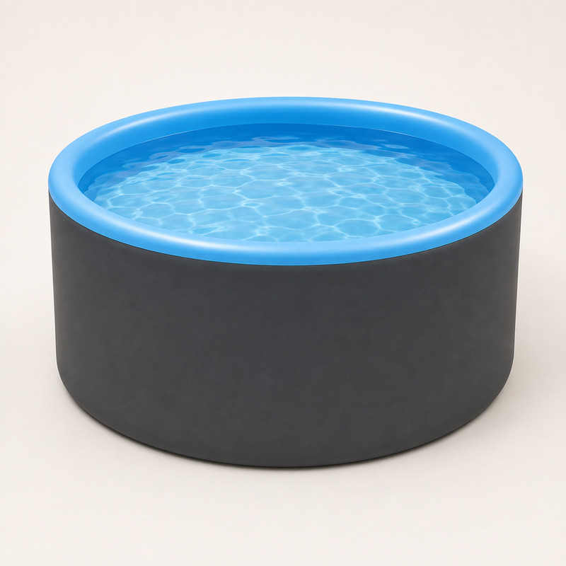 Hippool Circle pool on a plain background, charcoal drop-stitch wall with a rounded blue top rim, filled with clear water