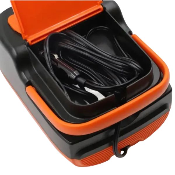 The pump in its open carry case, hose and power lead stowed inside