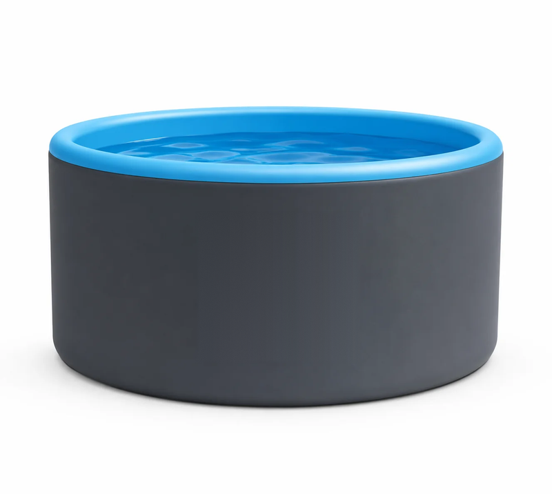 Photograph of the Hippool Circle pool seen straight on against a plain background, charcoal wall and blue top rim